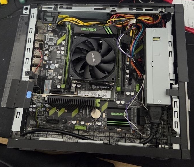 Server internals crammed into the modified Dell OptiPlex case
